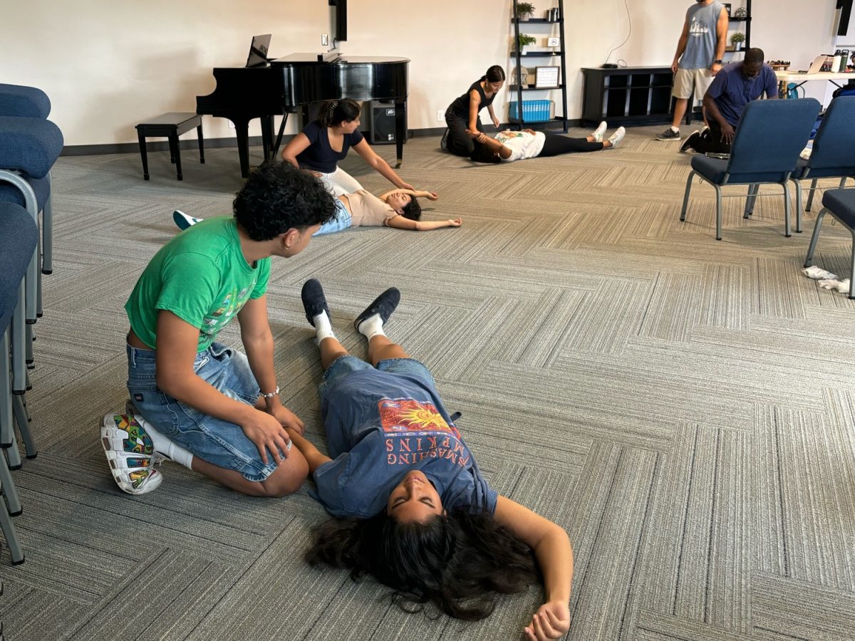 Yano (left) and Prakash (right) practicing basic life support at Angwin Hall during RA training.